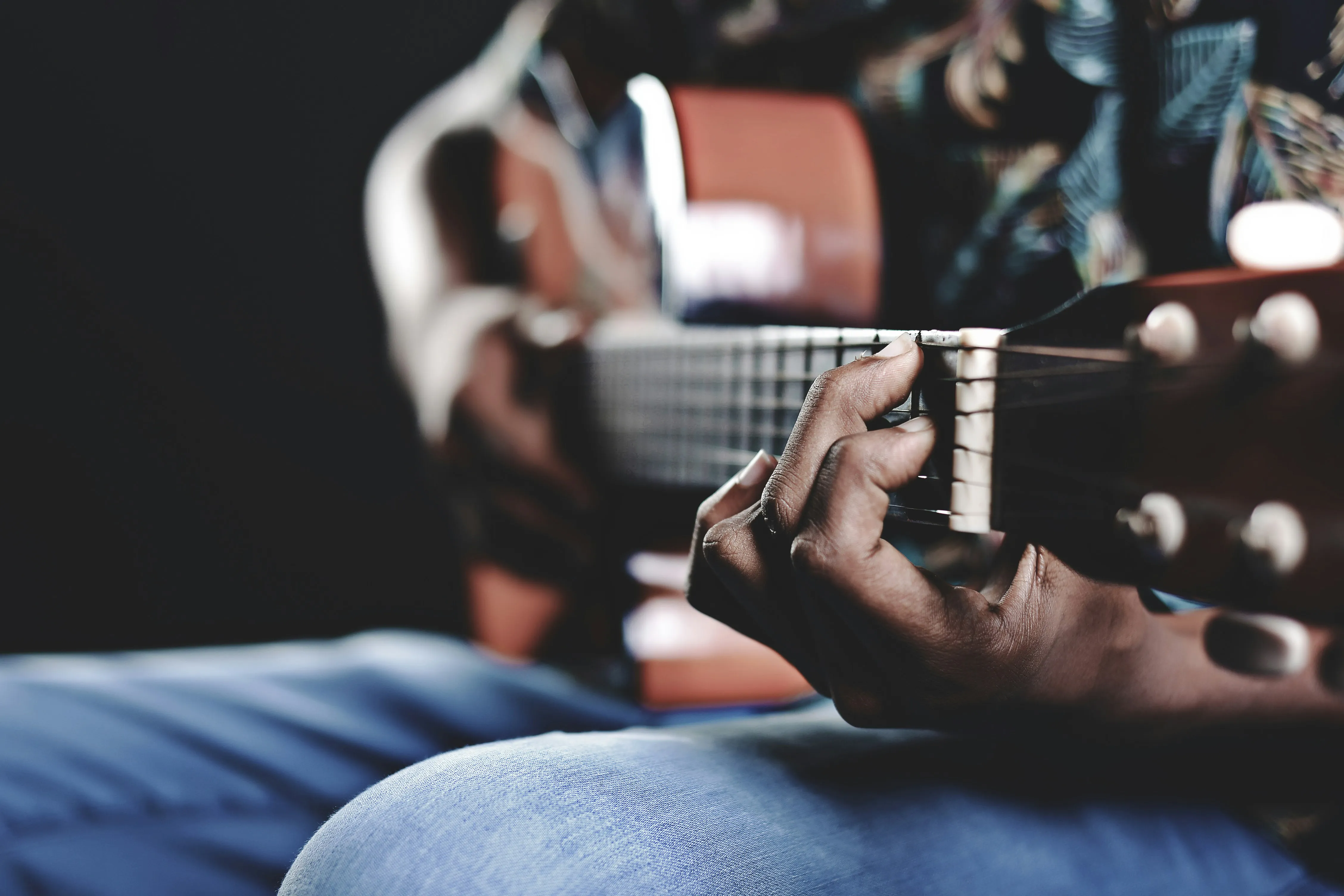 Acoustic guitar in low warm light